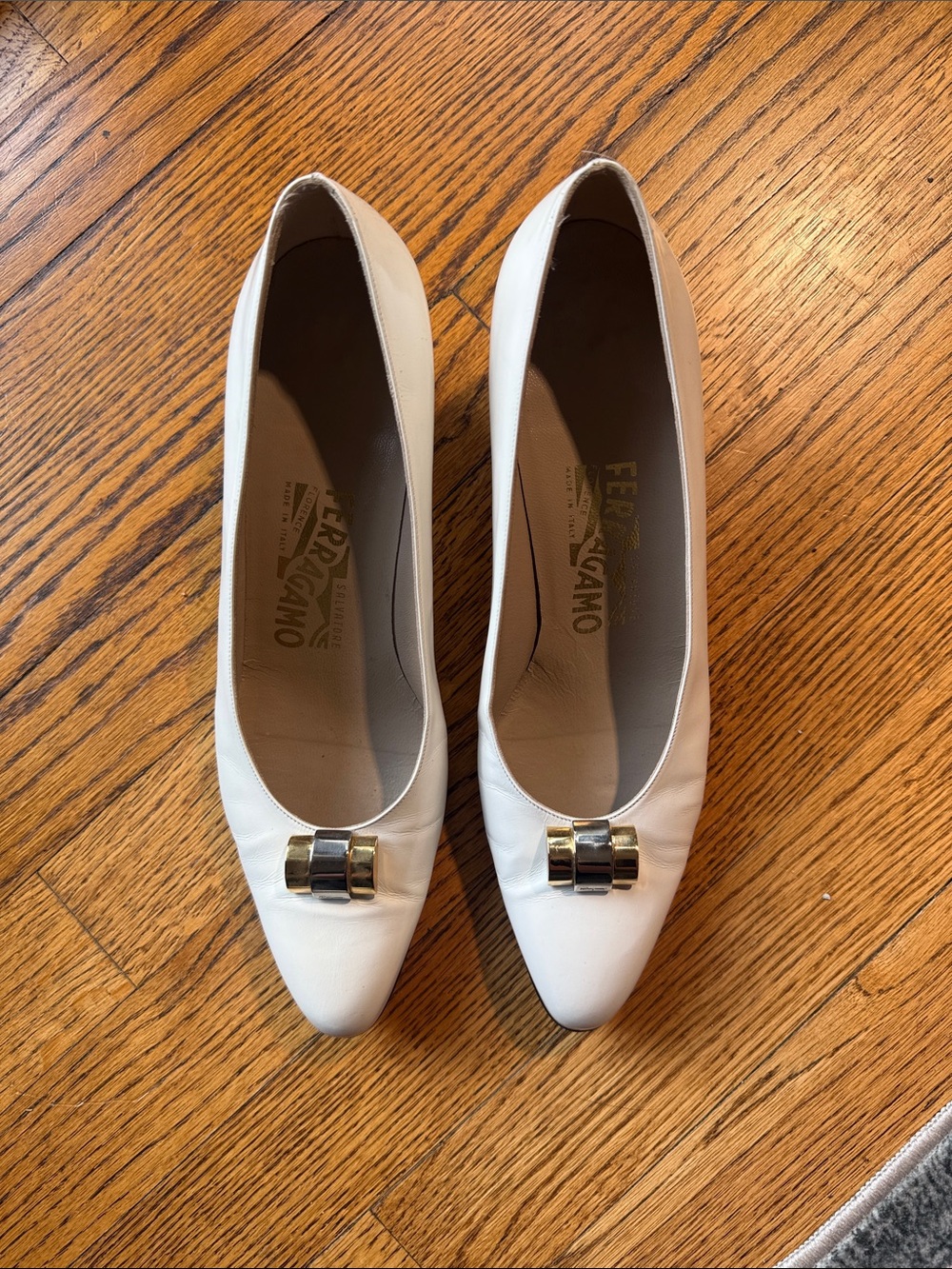 Salvatore Ferragamo White Leather with Metal Bow-Trim Pumps
